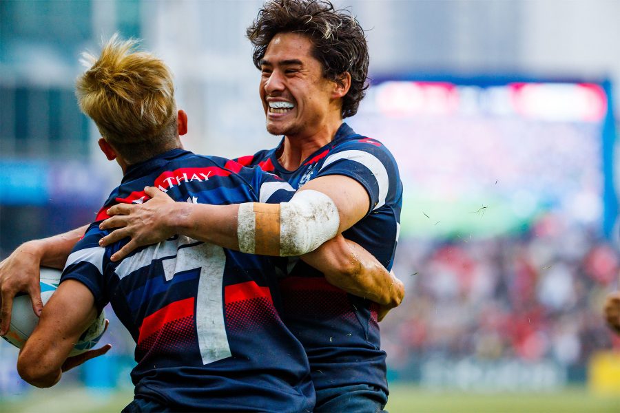 Rugby players hugging one another at the Hong Kong Rugby Sevens.